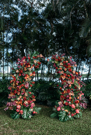 Aloha Tropical Floral Pillars;  Vibrant tropical wedding floral pillars for luxury Oahu elopement