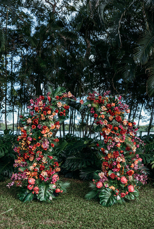 Aloha Tropical Floral Pillars;  Vibrant tropical wedding floral pillars for luxury Oahu elopement