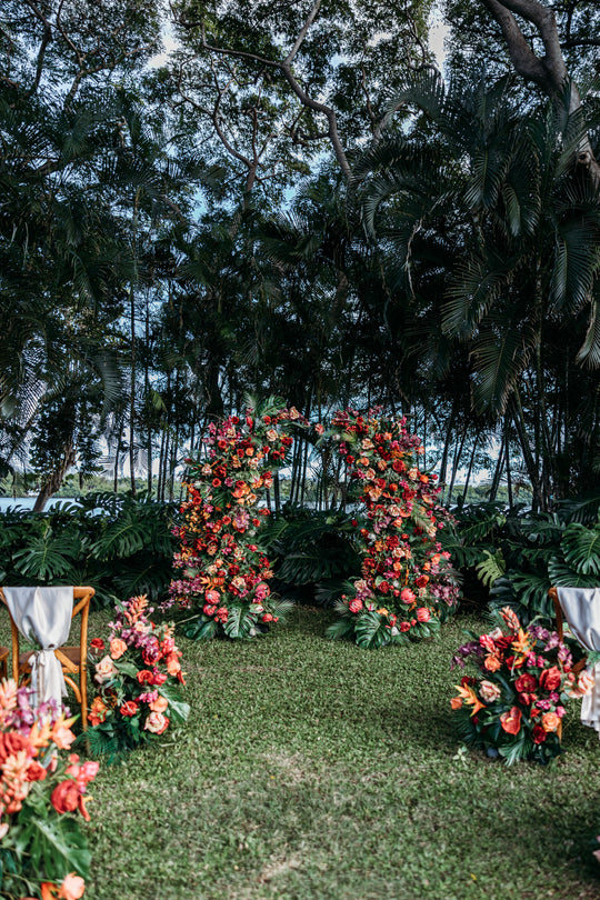 Aloha Tropical Floral Pillars;  Vibrant tropical wedding floral pillars for luxury Oahu elopement