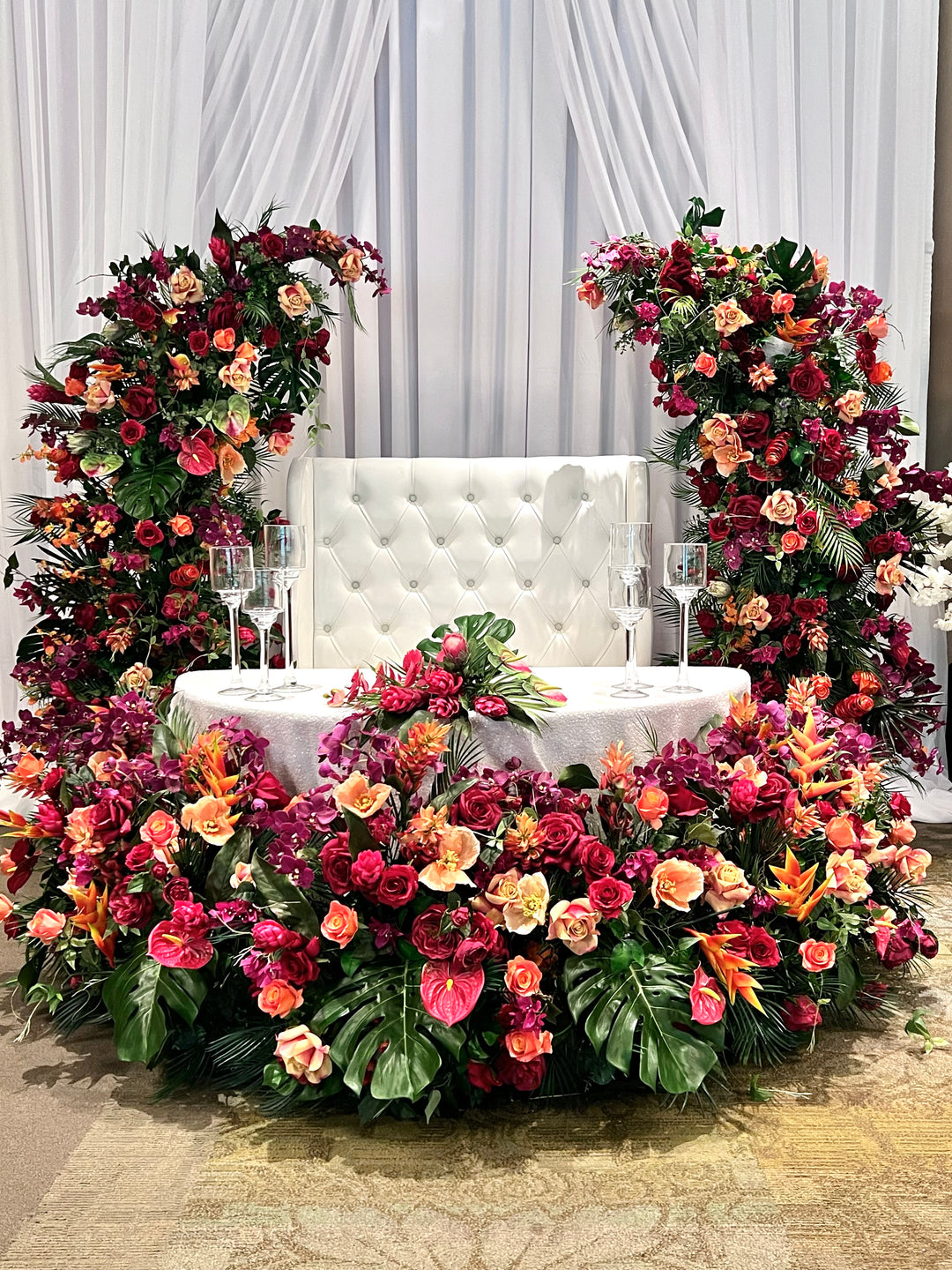 Aloha Tropical Floral Pillars;  Vibrant tropical wedding floral pillars for luxury Oahu elopement