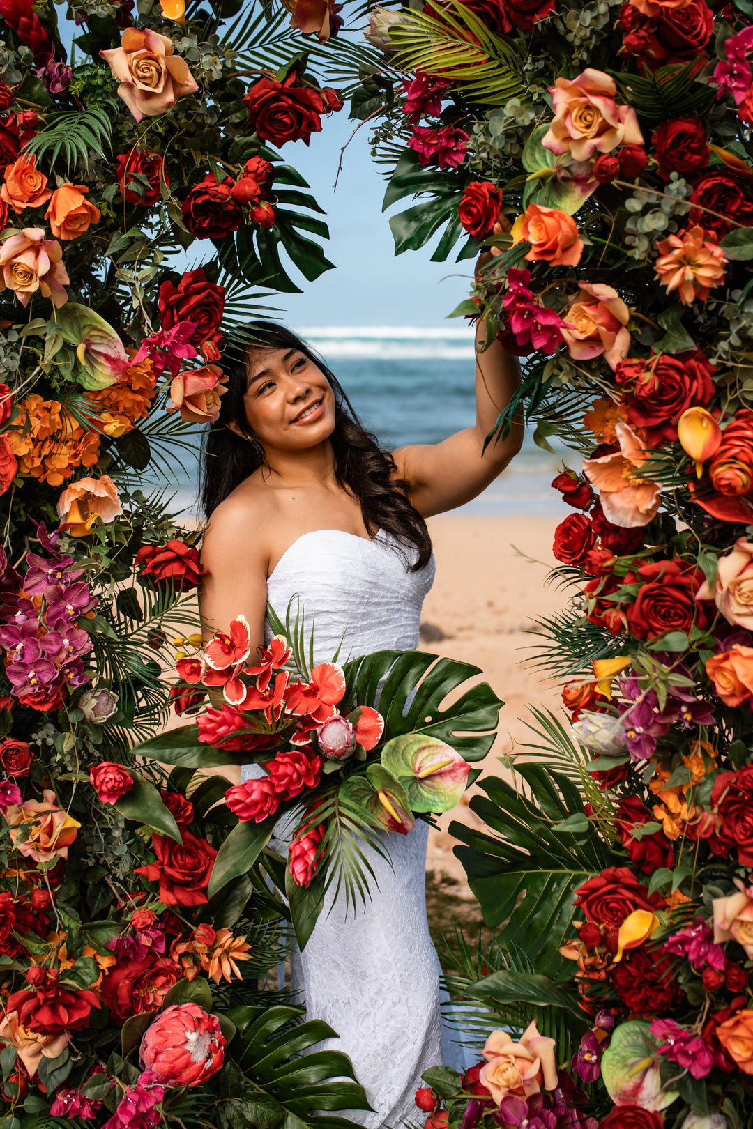 Aloha Tropical Floral Pillars;  Vibrant tropical wedding floral pillars for luxury Oahu elopement