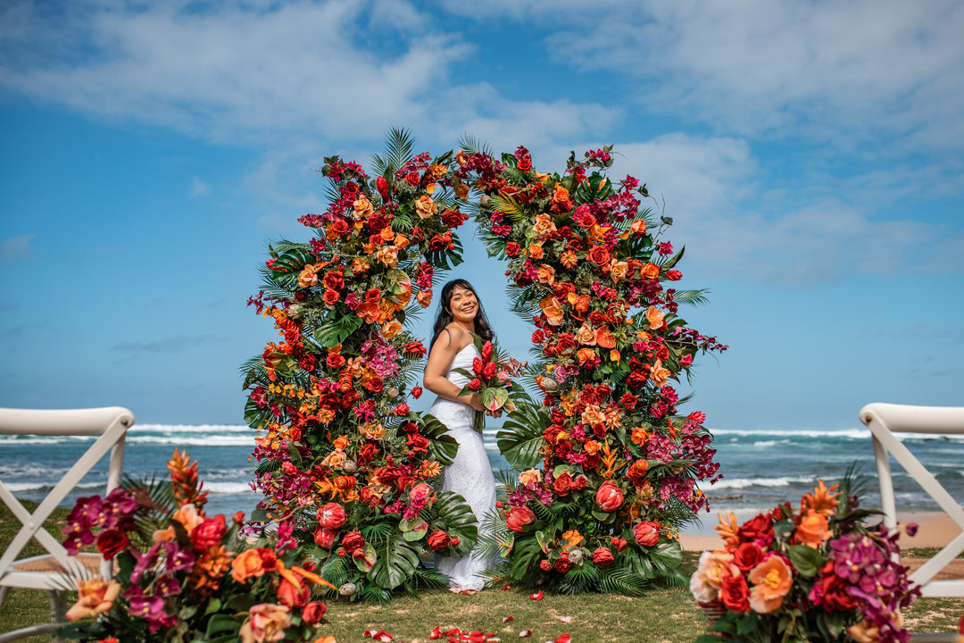 Aloha Tropical Floral Pillars;  Vibrant tropical wedding floral pillars for luxury Oahu elopement