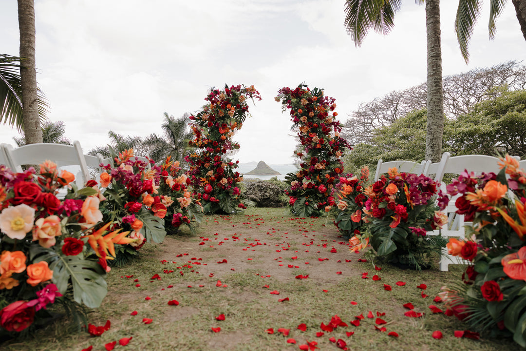 Aloha Tropical Floral Pillars;  Vibrant tropical wedding floral pillars for luxury Oahu elopement