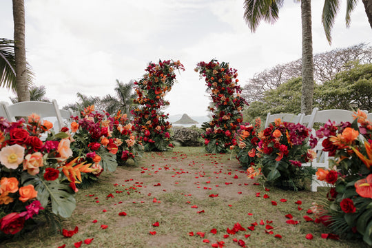 Aloha Tropical Floral Pillars;  Vibrant tropical wedding floral pillars for luxury Oahu elopement